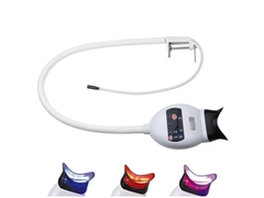 Máquina de blanqueamiento de dientes montada en una mesa de 3 colores