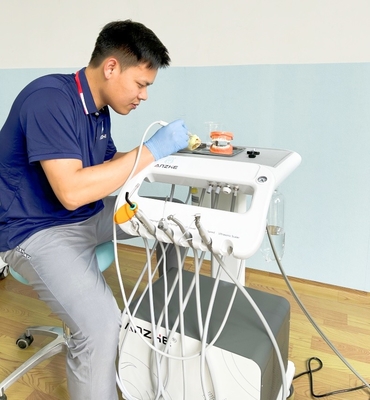 Unidad de carrito de dentista Conjuntos móviles de tratamiento para cirugía dental Turbina móvil dental de bajo ruido 550W carrito móvil dental